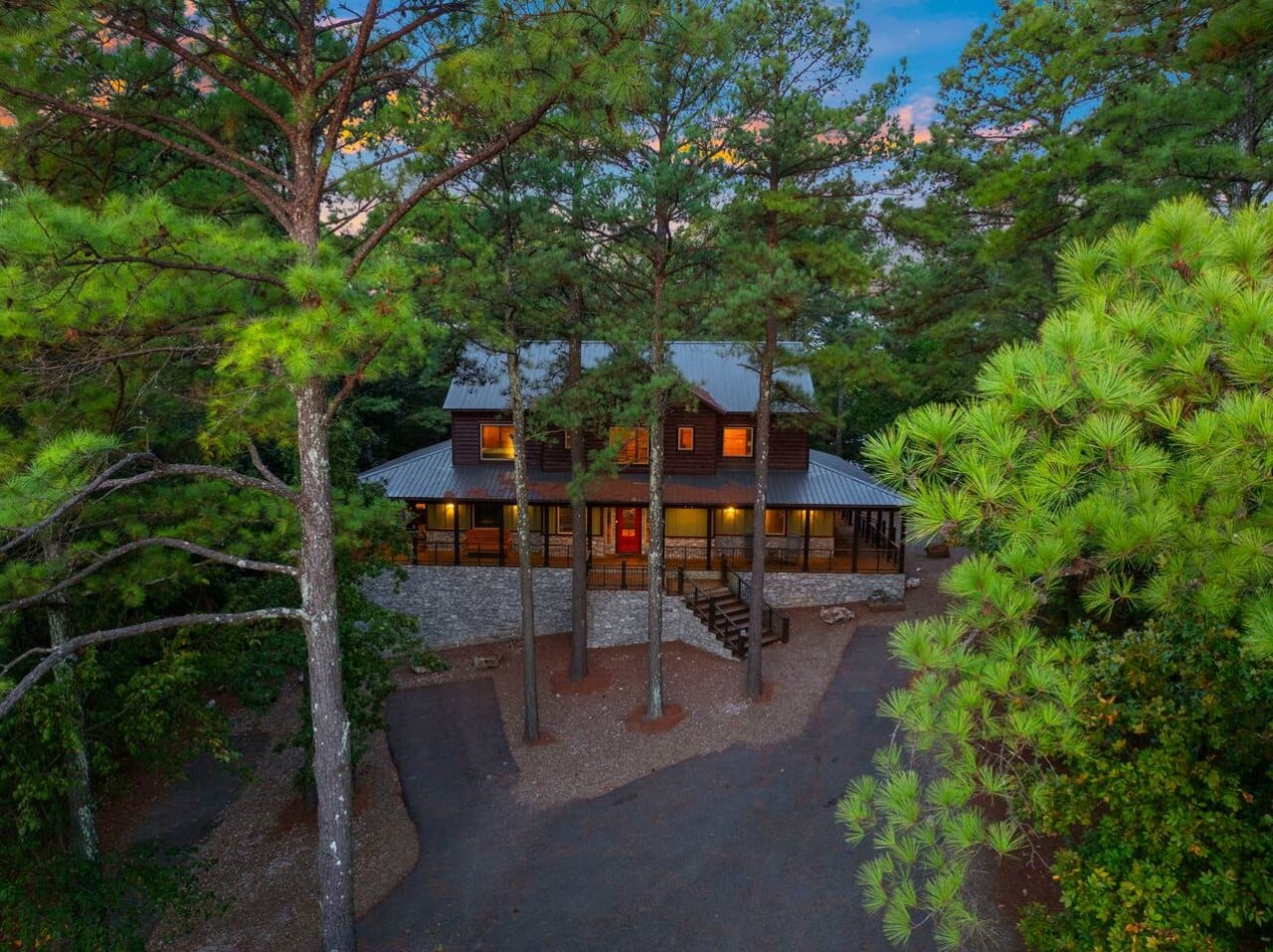 Tucked among the pines, this luminous cabin is your perfect after-dark escape.