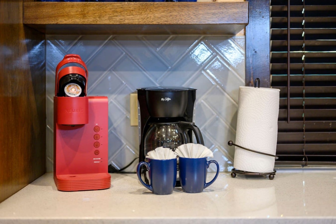A full coffee station with Keurig, drip maker, and mugs means mornings start perfectly.