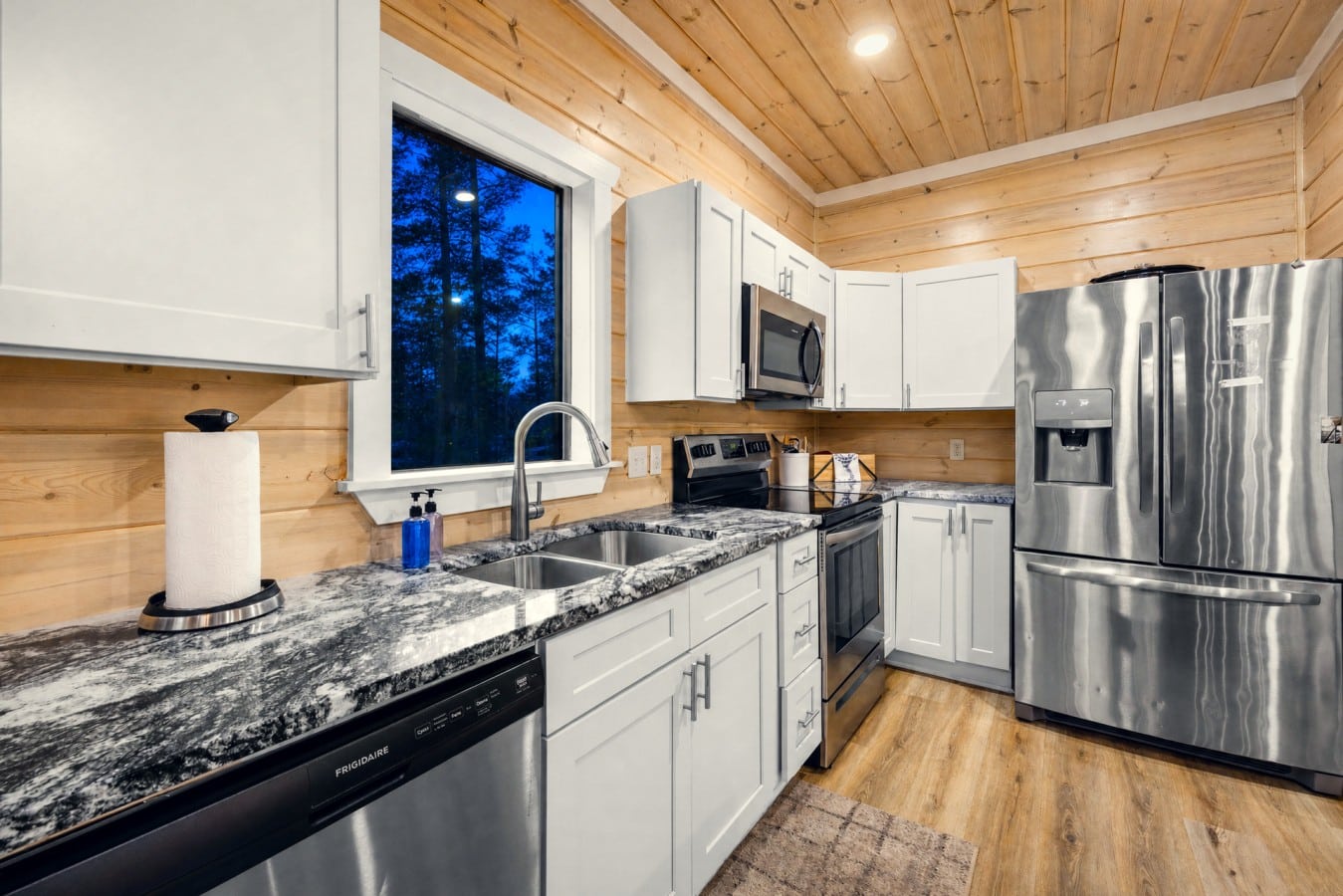 Cook full vacation meals with ease in a stainless-appliance kitchen built for entertaining.