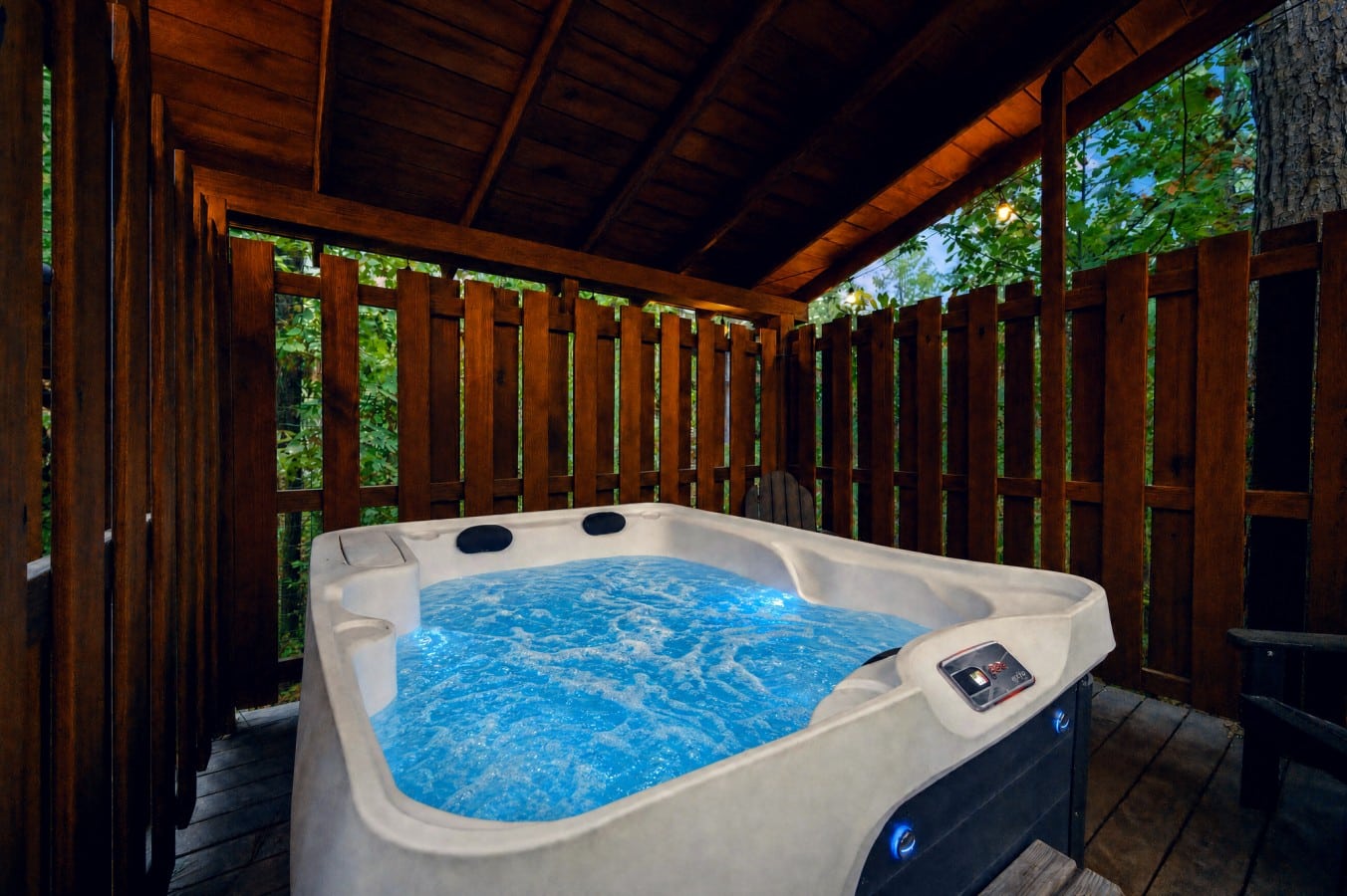 Slip into the bubbling hot tub and let the forest privacy do its thing.
