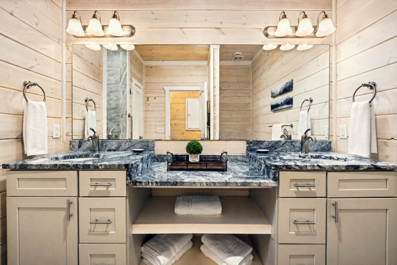 Crisp blue granite and dual vanities mean zero morning traffic jams.