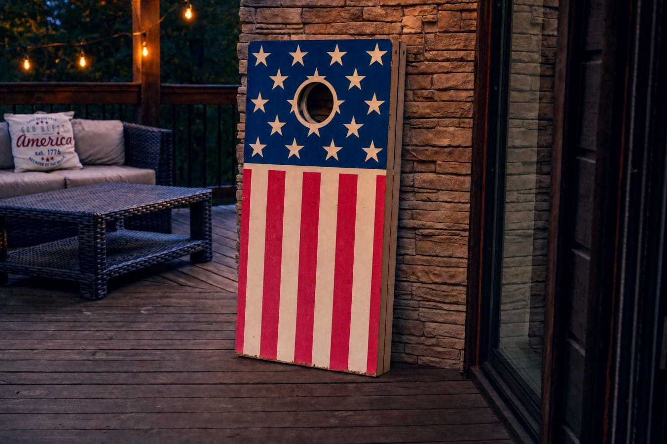Challenge friends to cornhole under the string lights for instant cabin fun.