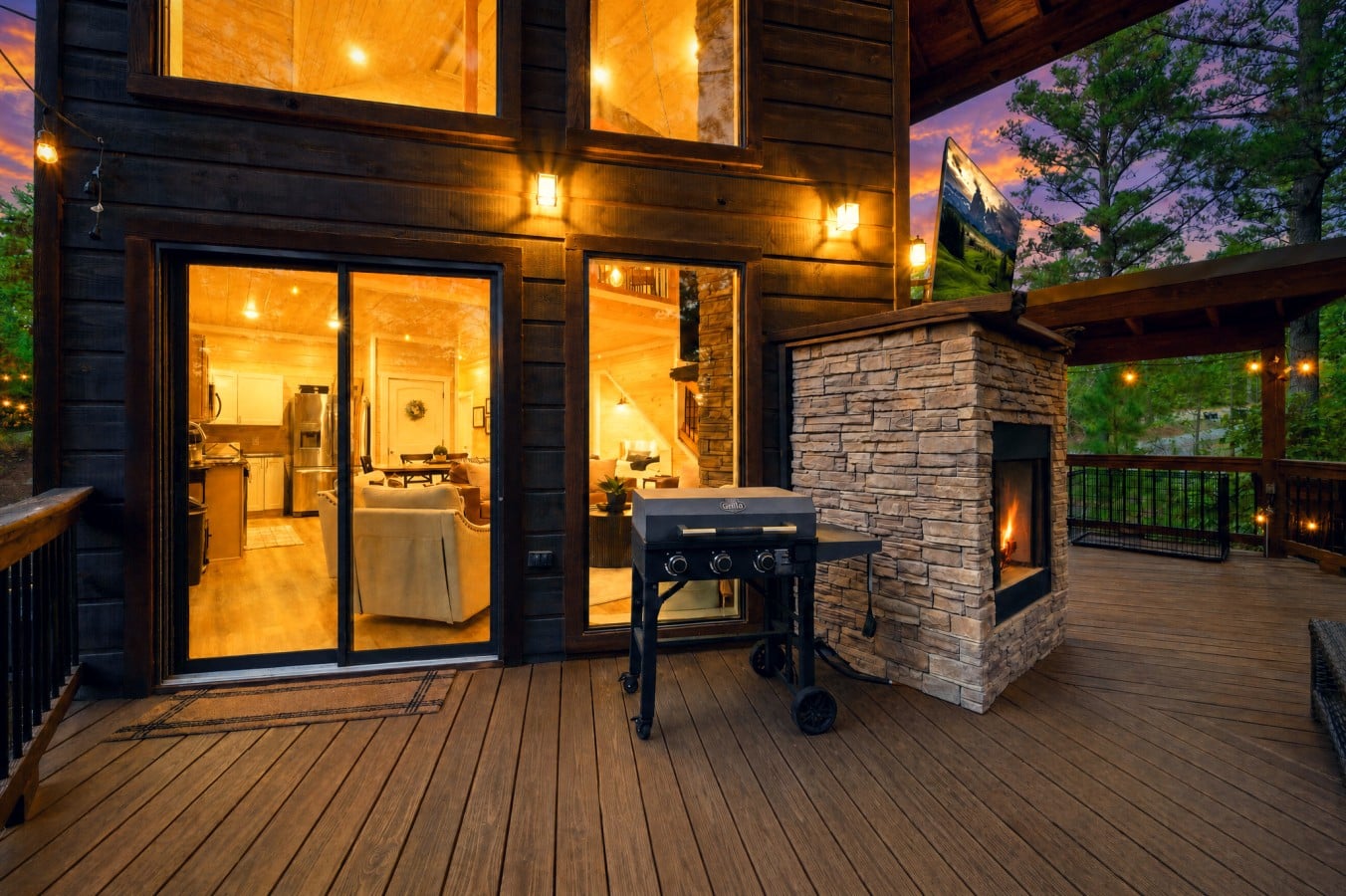 Grill, lounge, and watch the sunset blaze from this incredible outdoor living space.