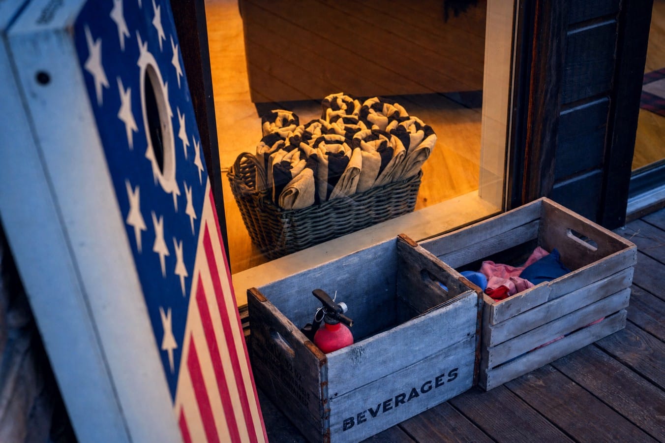 Cold drinks, fresh linens, and a cornhole board — the perfect recipe for fun.