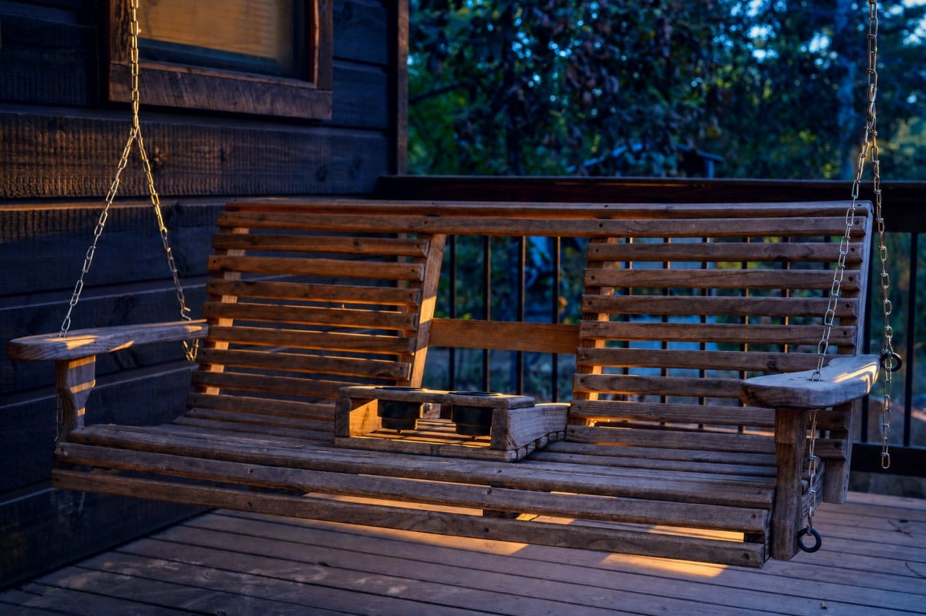 Slow down and savor the golden hour from your own private porch swing.