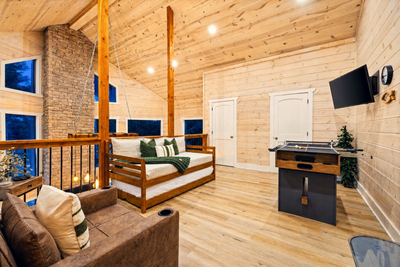 Challenge your crew to foosball, then crash on the hanging daybed — all without leaving the loft.