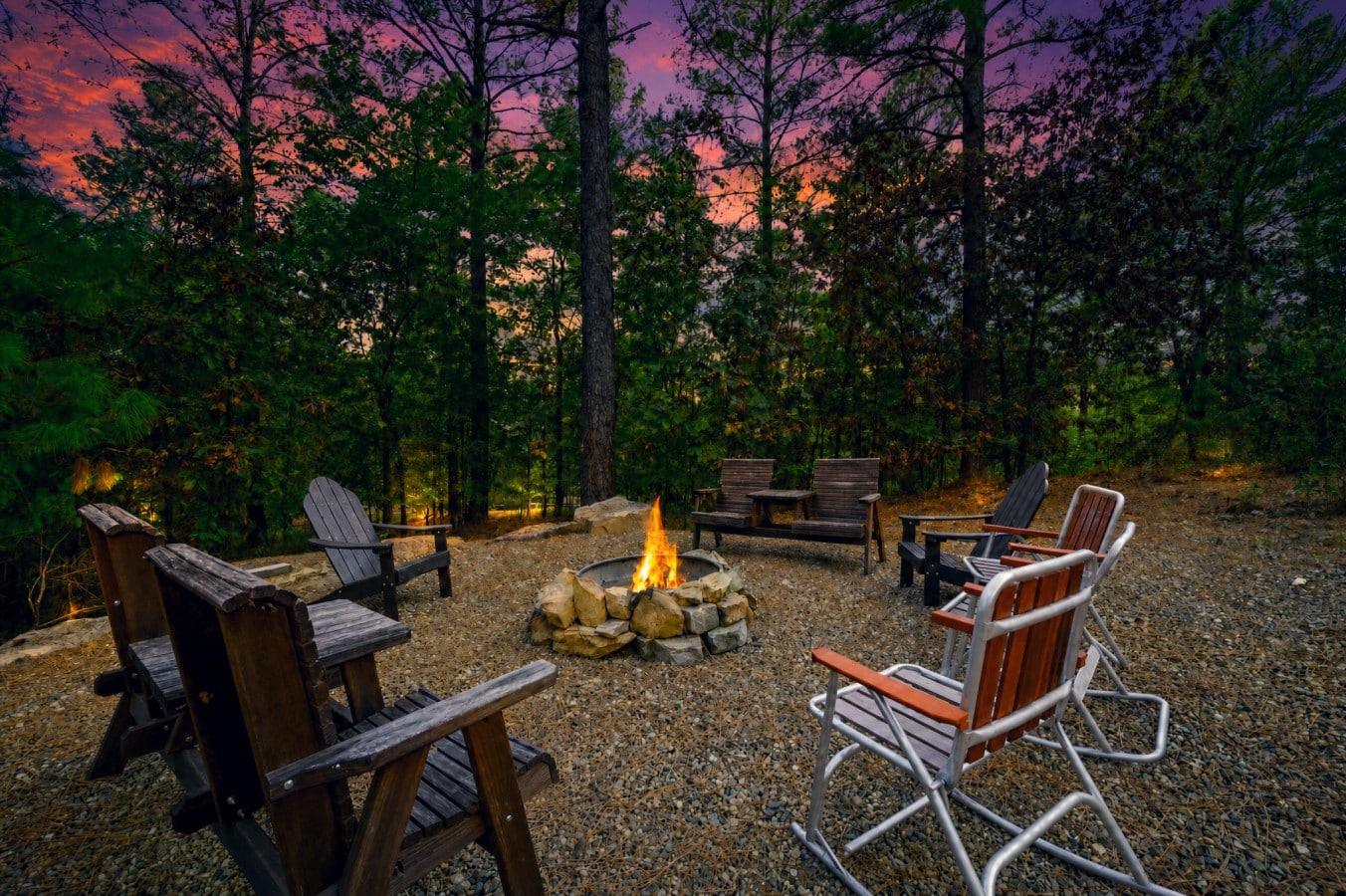 Flames crackle, chairs circle, and the sky turns violet — pure magic awaits.