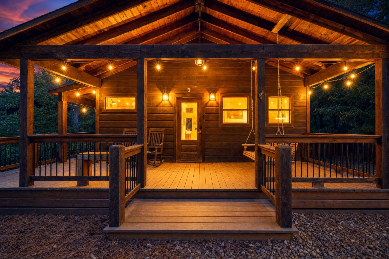 Rock away the evening on a glowing porch that makes arriving feel like arriving home.