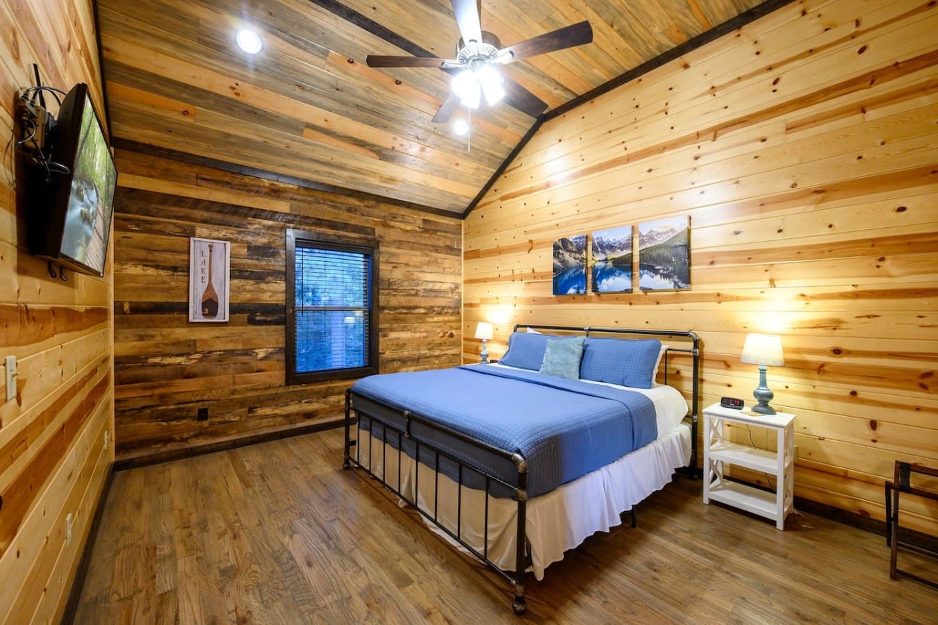 Watch TV from bed or lounge under the ceiling fan in this spacious mountain king room.