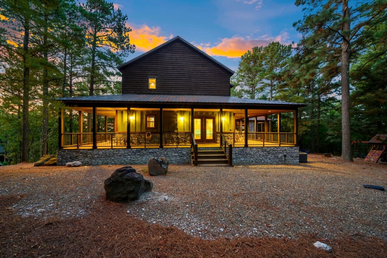 Every window glows with warmth, welcoming you home after a perfect day out.