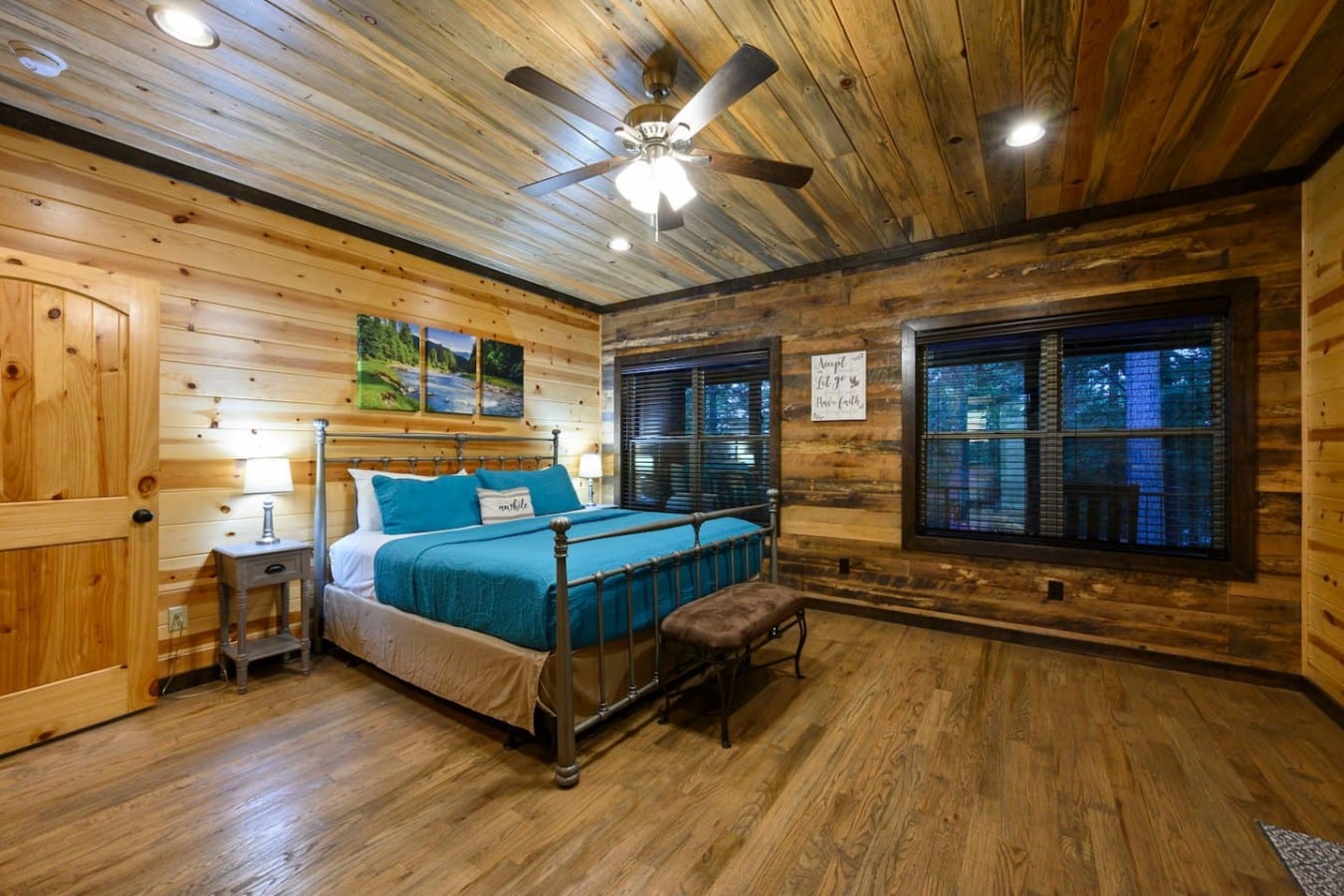 Drift off in a king iron bed wrapped in rustic charm and mountain-lodge comfort.