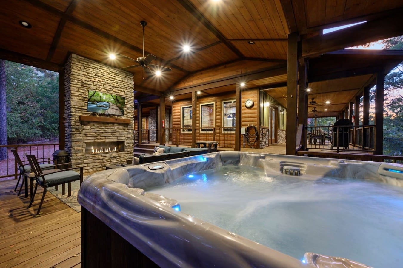 Soak under the stars in a glowing hot tub while the fireplace crackles beside you.