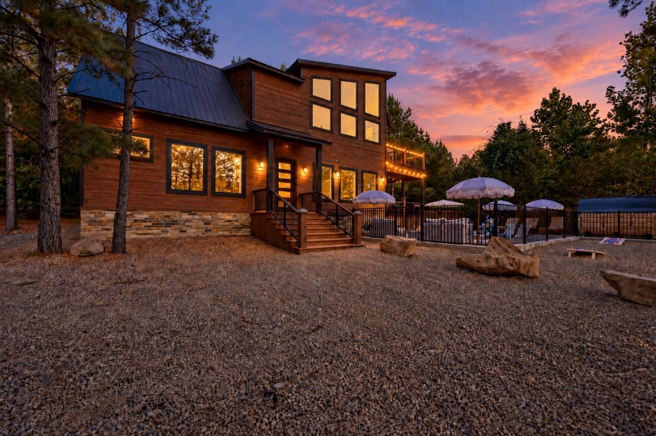 A cabin this beautiful at dusk makes you never want to leave — and you don't have to.
