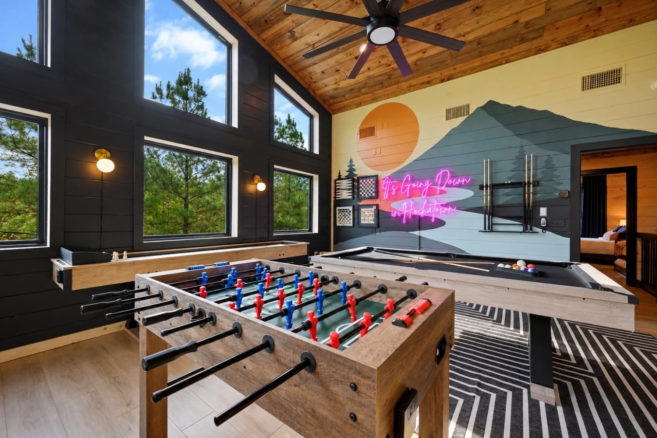 Challenge someone to foosball or pool beneath a ceiling built for serious fun.