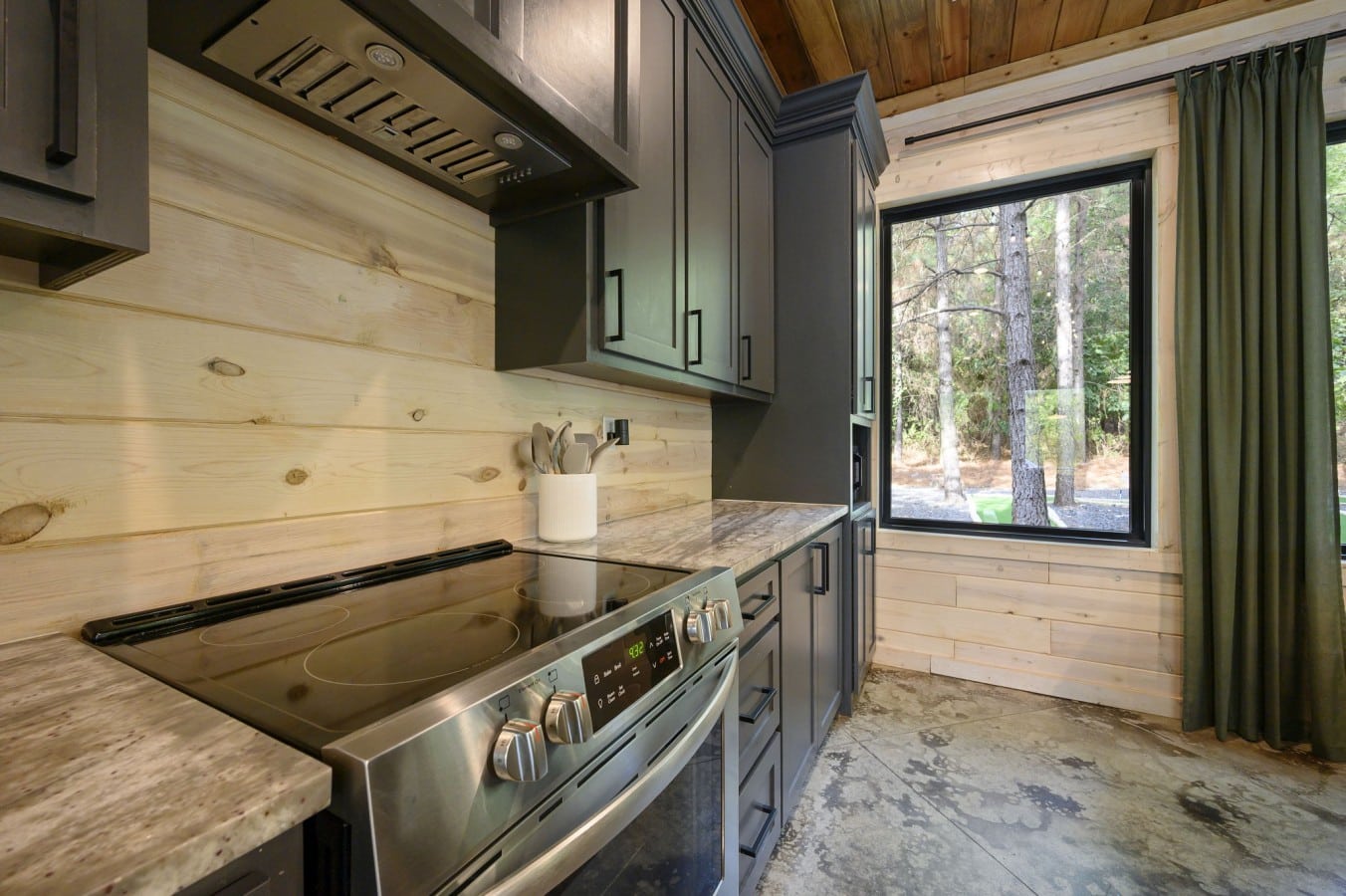Whip up cabin feasts on a premium range while pine trees sway just beyond your window.