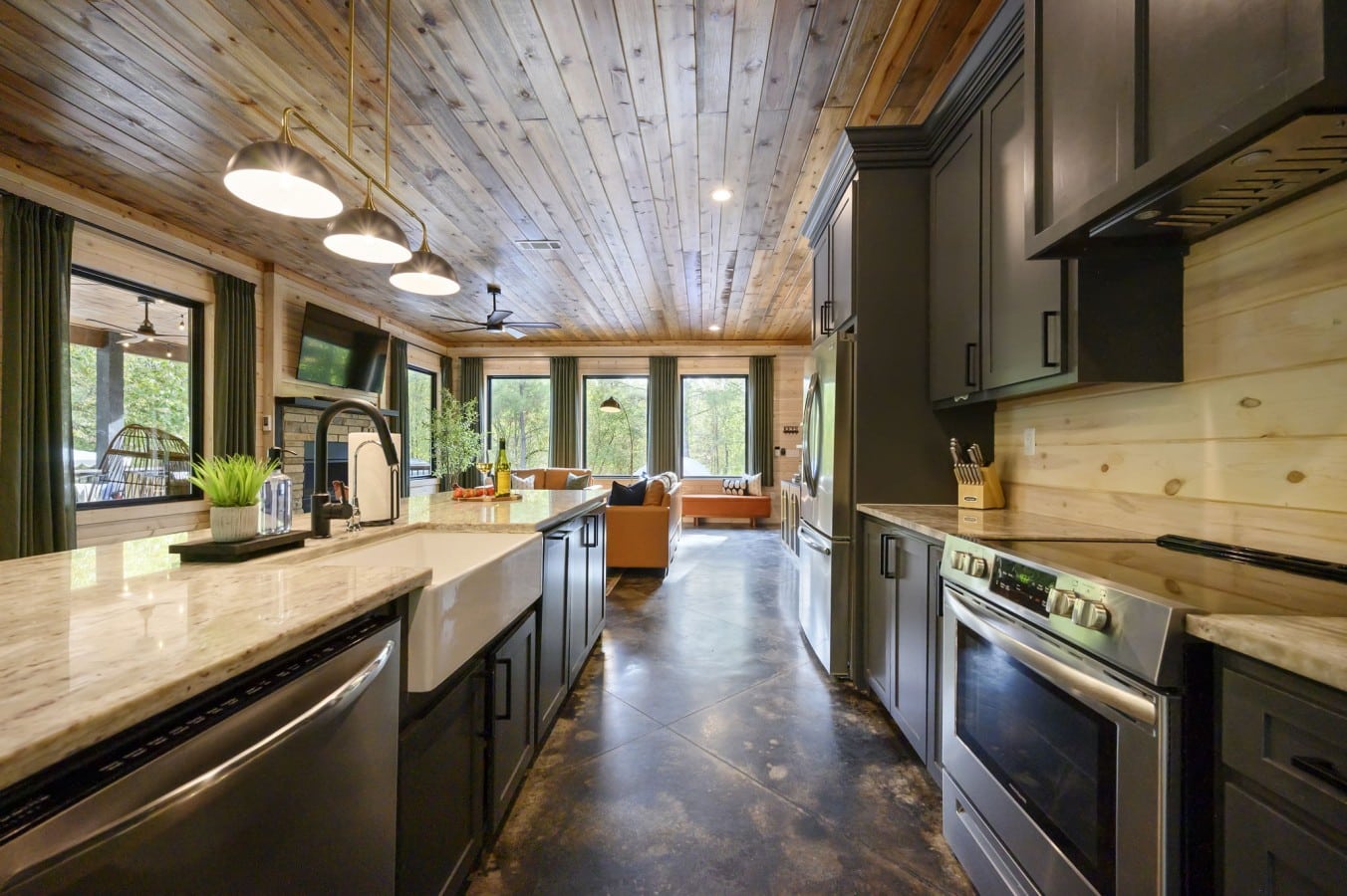 Cook gourmet meals in a chef's kitchen that opens straight into your cozy fireside living room.