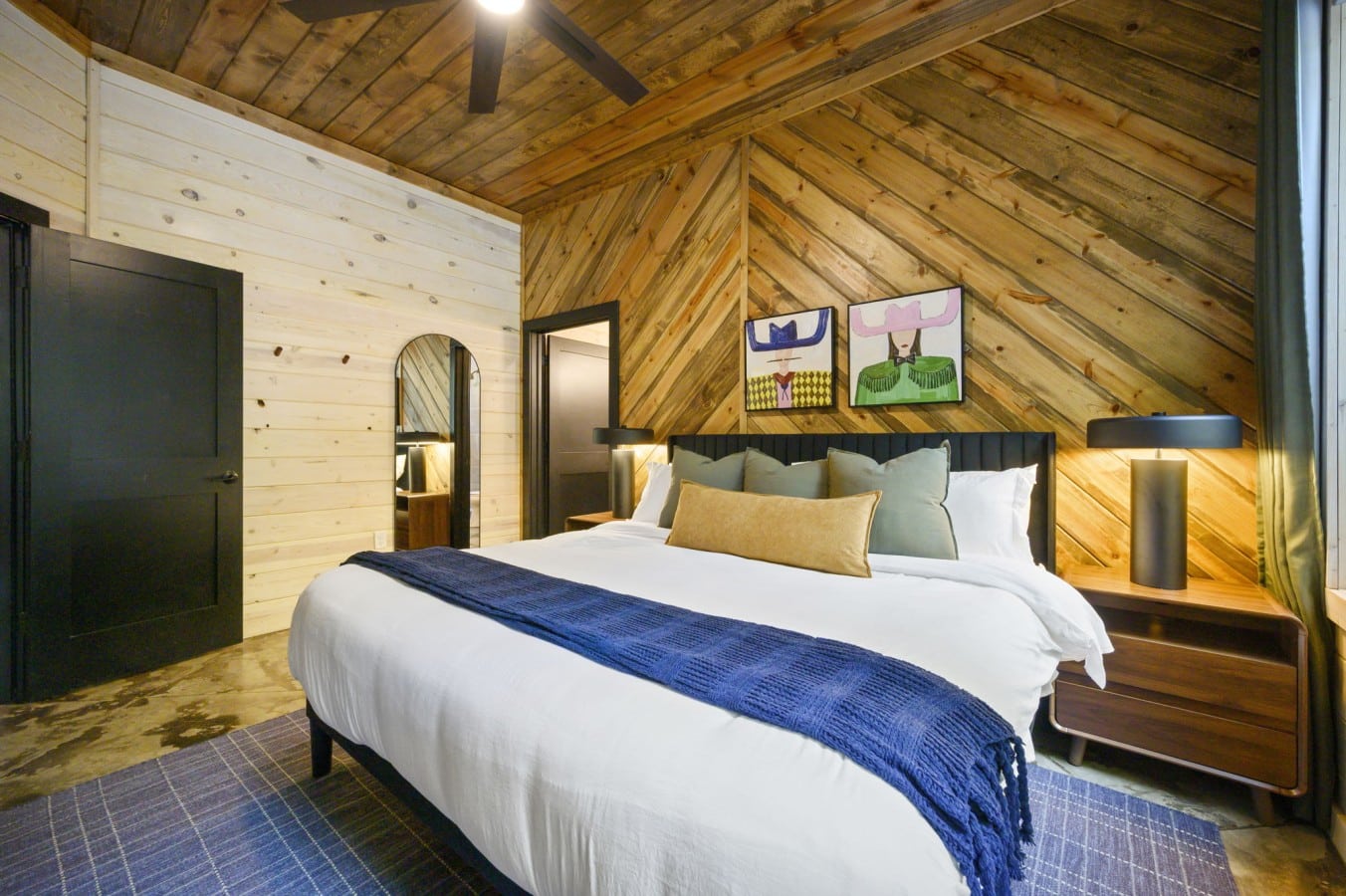 That cedar feature wall isn't just stunning — it sets the mood for total relaxation.