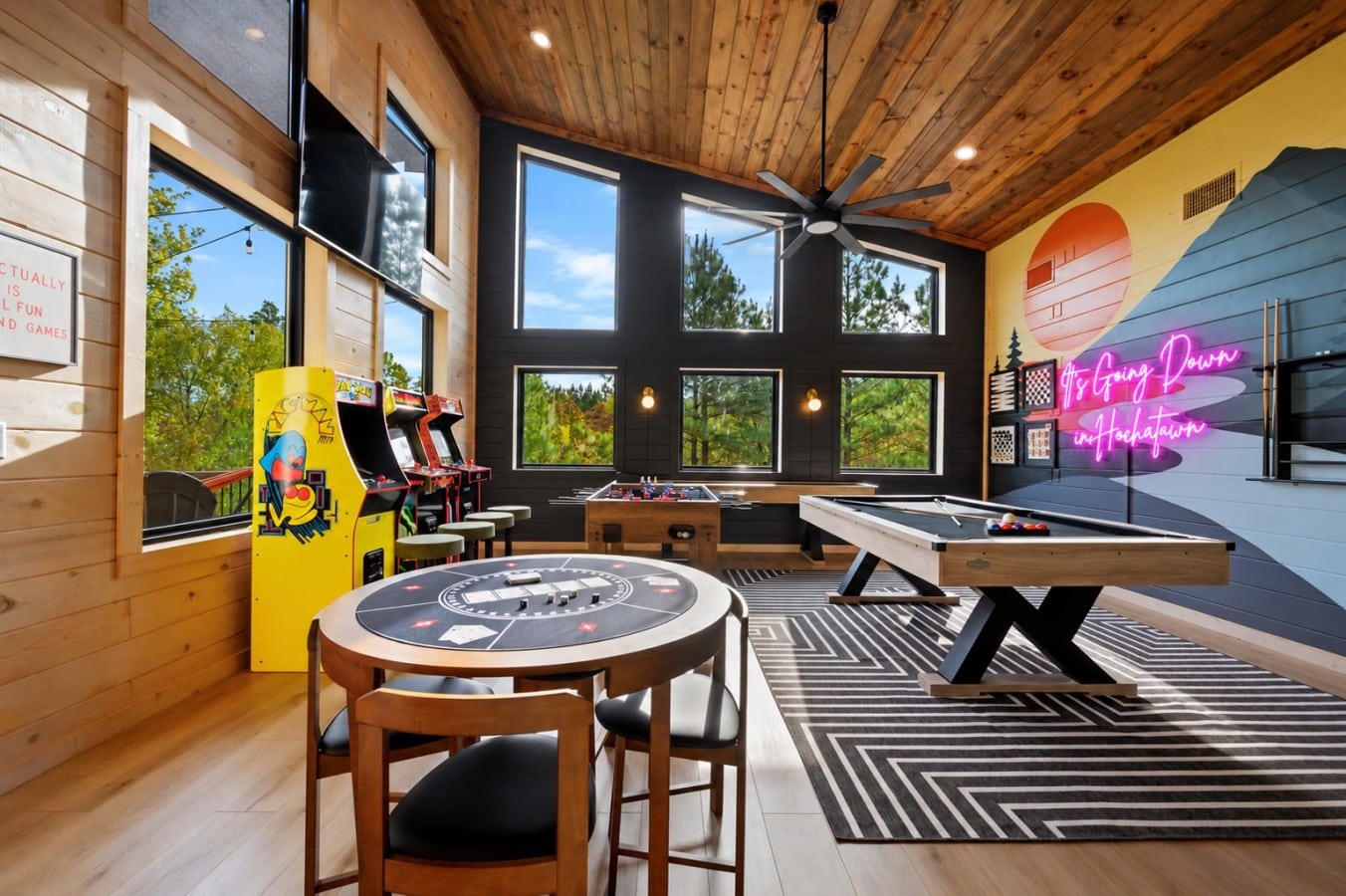 Poker table, pool table, and retro arcades. The game room is where the trip comes alive.