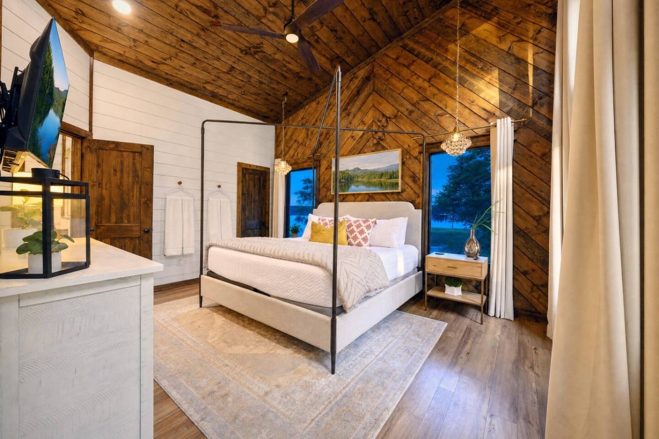 Wake up to vaulted ceilings and twilight views from a bedroom that feels like luxury.