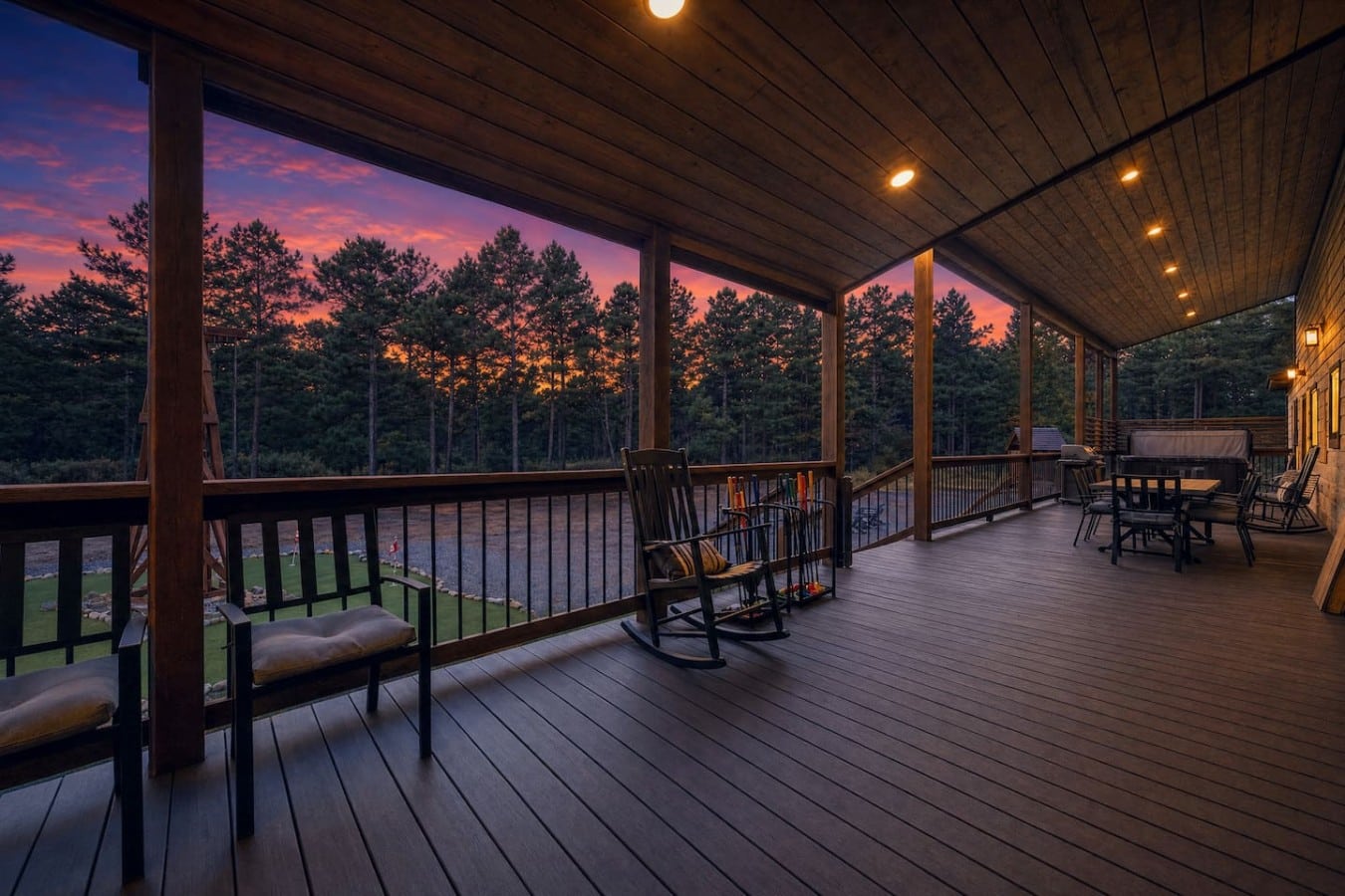Watch the sun melt behind the pines from a rocking chair with a drink in hand.