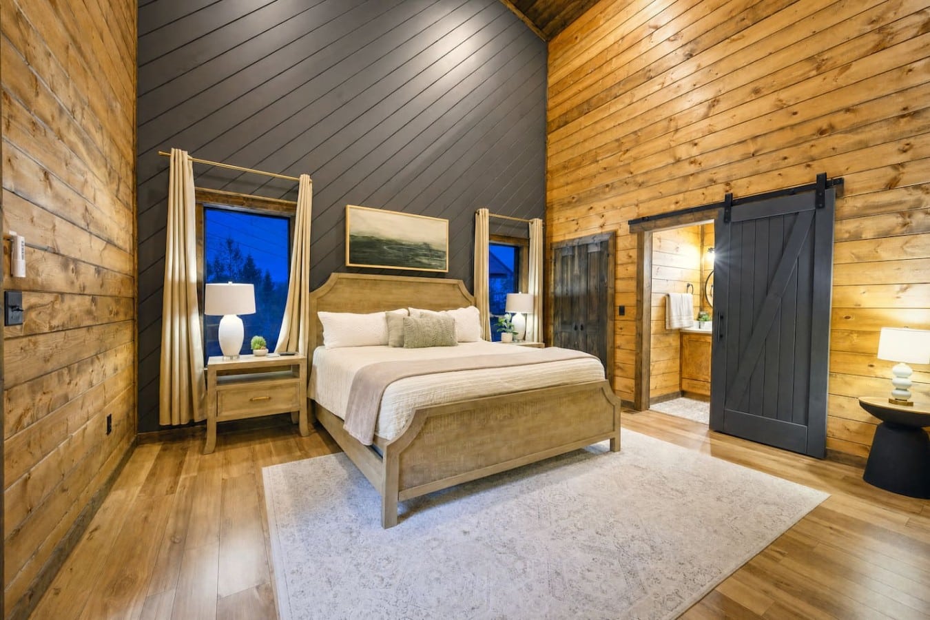 Slide open the barn door and step into a spa-like ensuite made for slow mornings.
