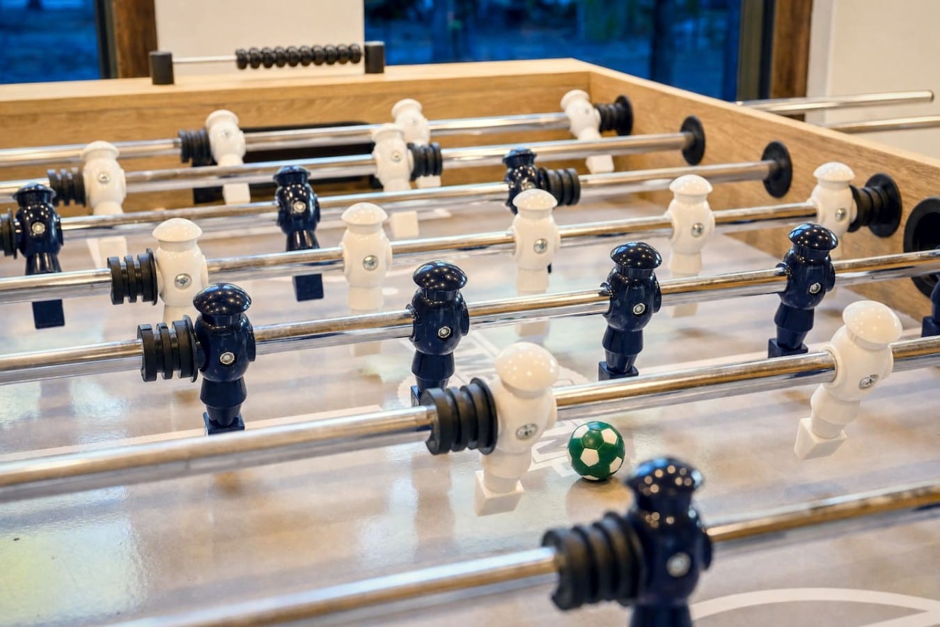 Settle in for a spirited foosball match that keeps everyone at the table longer.