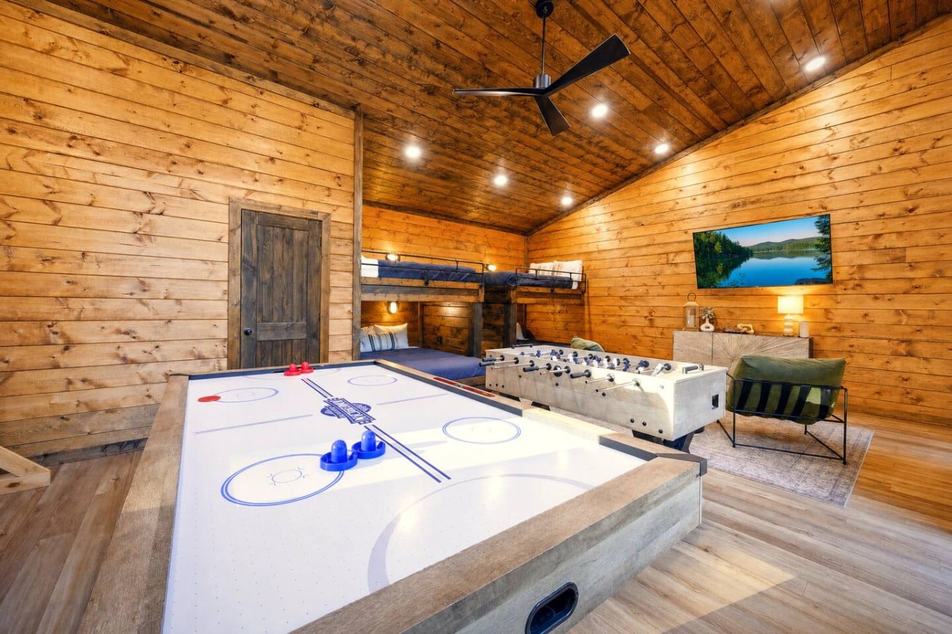 Bunk beds and arcade games in one room means the kids will never want to leave.