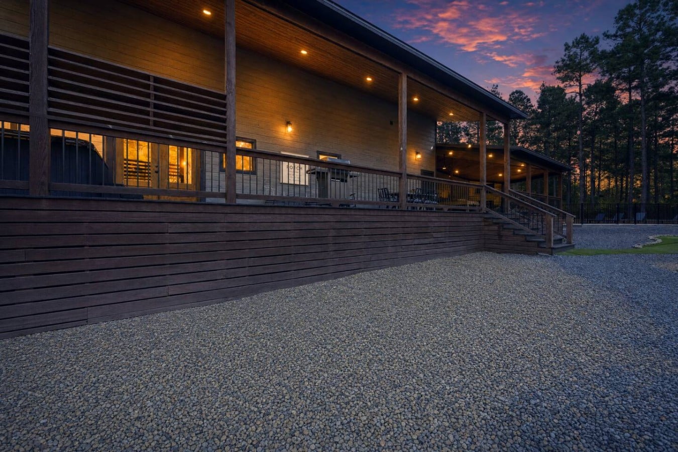 Pull up to a lodge so majestic the purple sky seems to crown it like royalty.