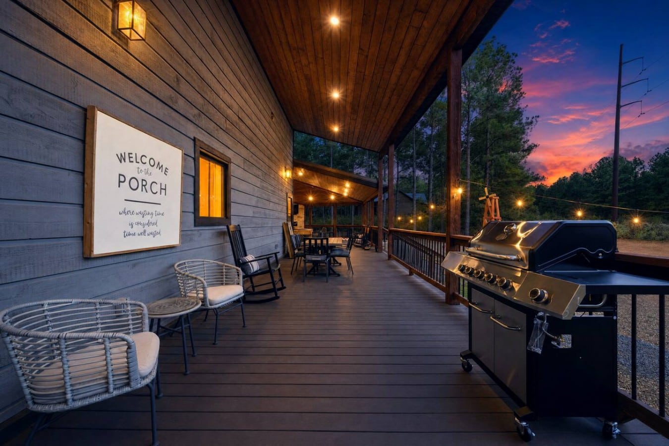 String-lit rocking chairs and a gas grill make this porch your evening headquarters.