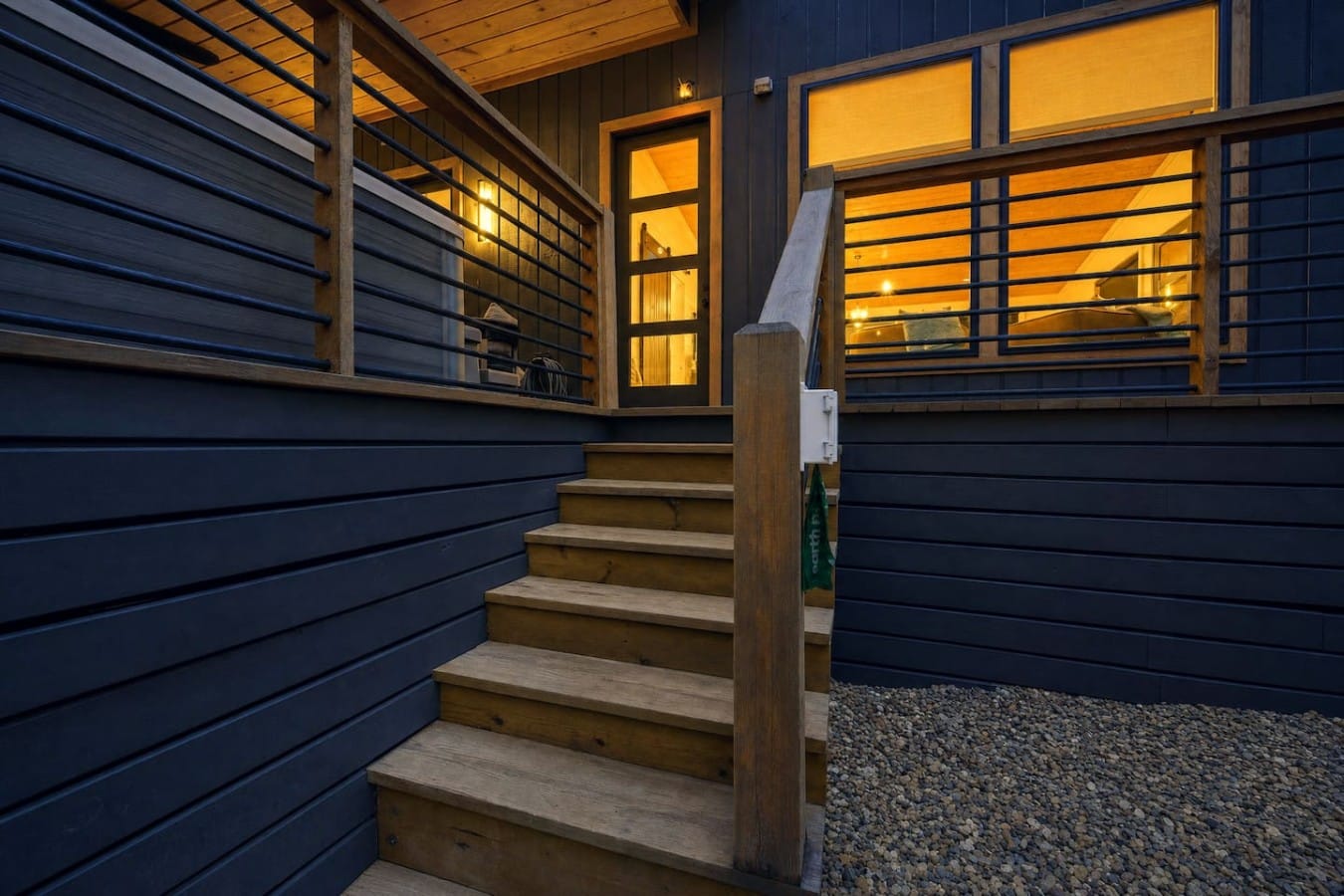 Warm light spills from every window, beckoning you home after a full day exploring Hochatown.