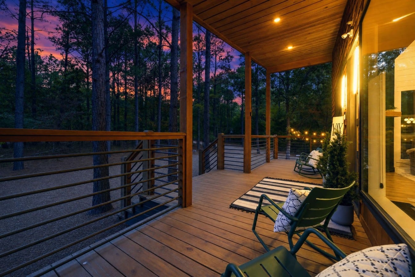 Rock gently and breathe deep as a rose-and-blue sunset fades above the pine canopy.