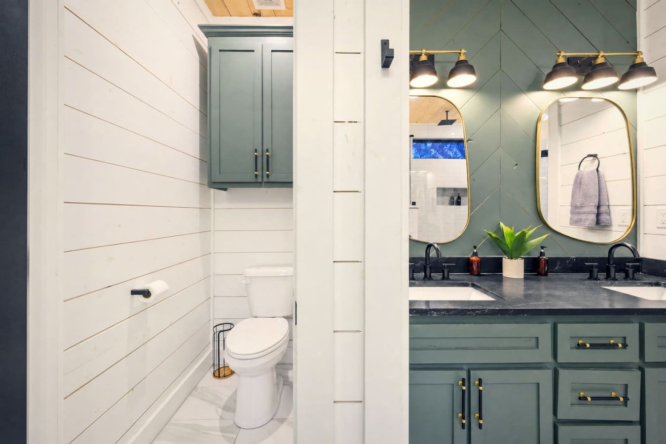 A spa-worthy double vanity and private water closet mean no waiting—even for a crowd.
